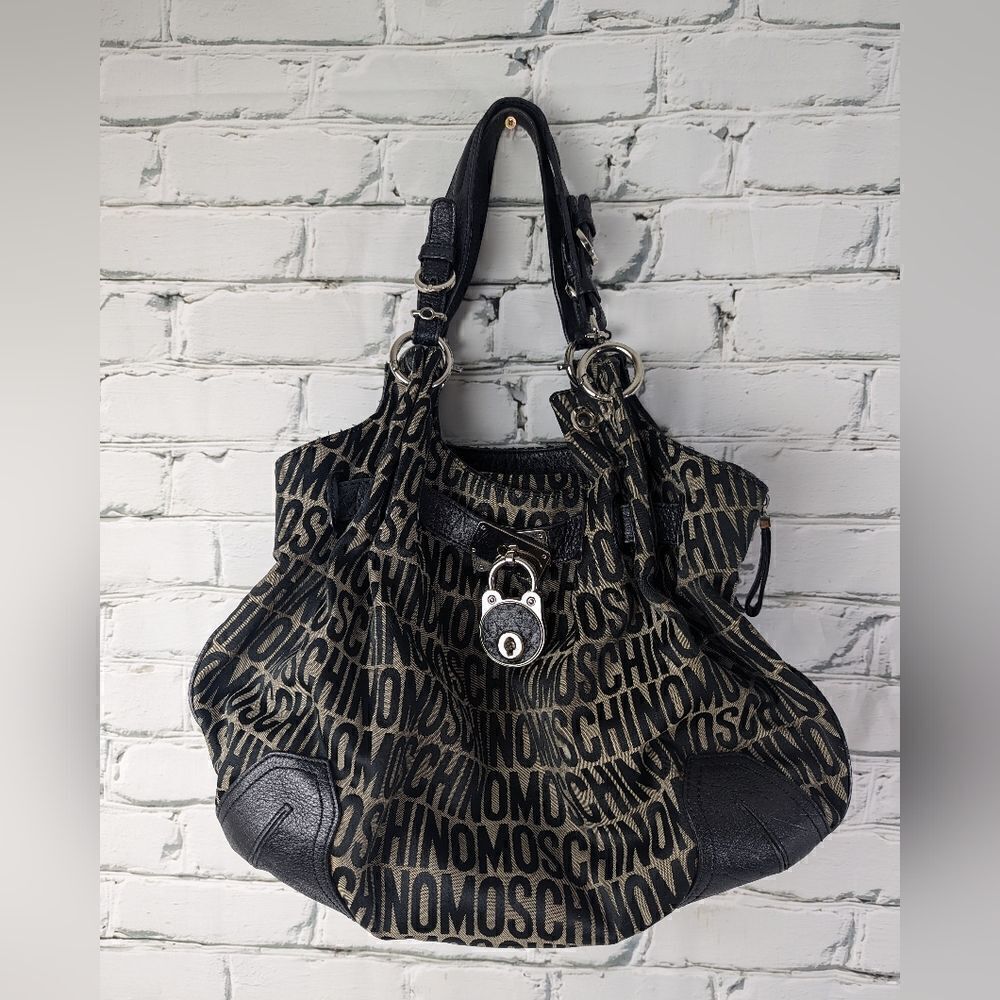 Moschino Monogram shoulder bag, slouchy fabric and leather handbag,